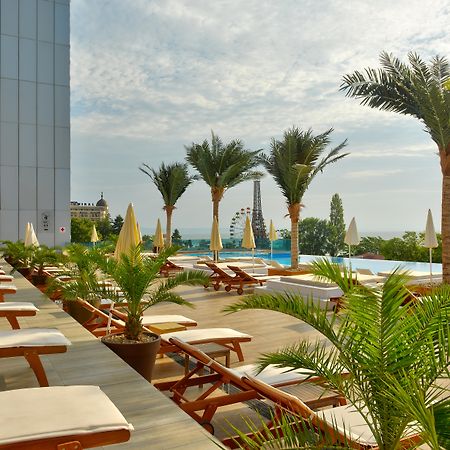国际酒店-赌场和高层套房 金沙 外观 照片 The pool at the hotel