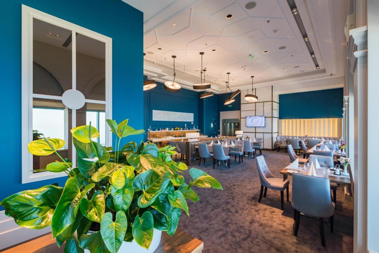 国际酒店-赌场和高层套房 金沙 外观 照片 The interior of the lounge