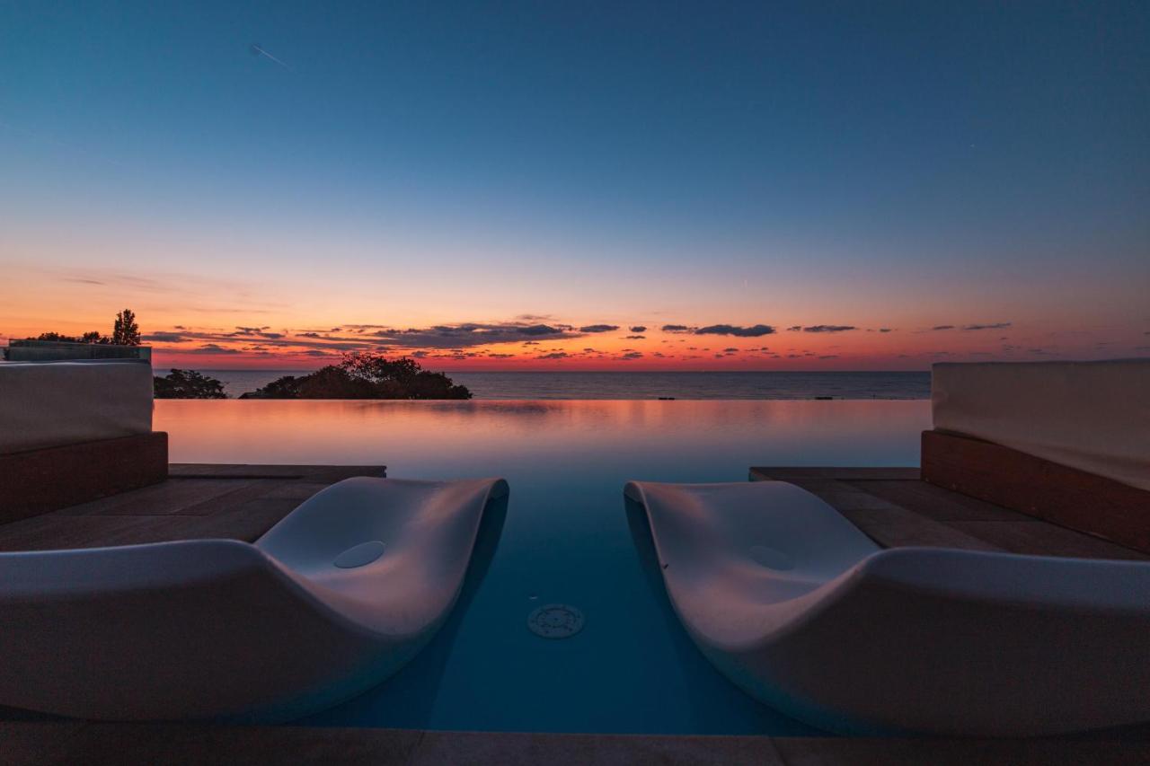 国际酒店-赌场和高层套房 金沙 外观 照片 Sunset at the pool